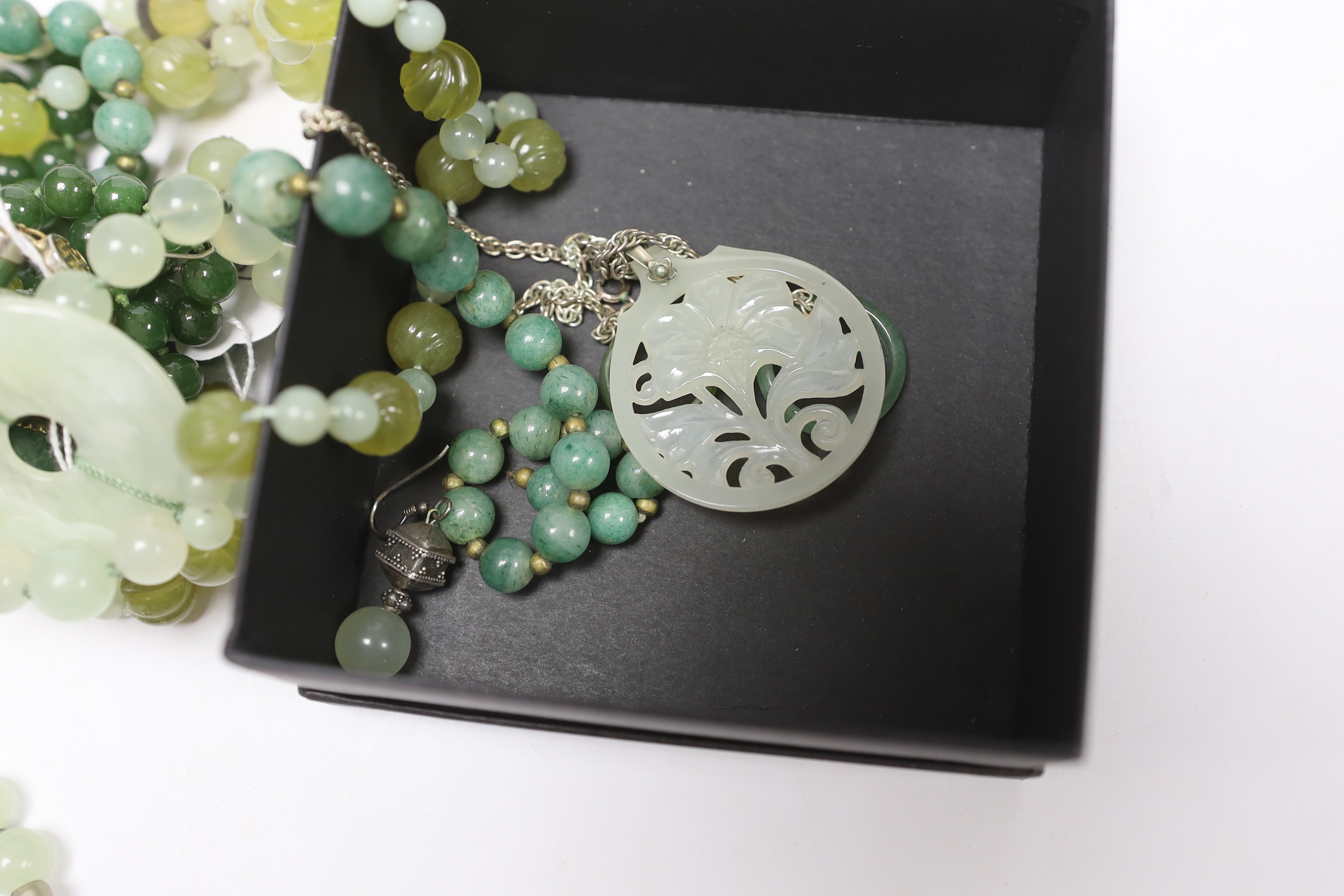 A group of assorted jade jewellery including bracelet, necklaces etc.